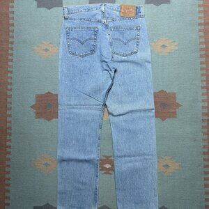 Vintage 90s Levi’s 501 jeans button fly straight leg light wash women USA 32x30